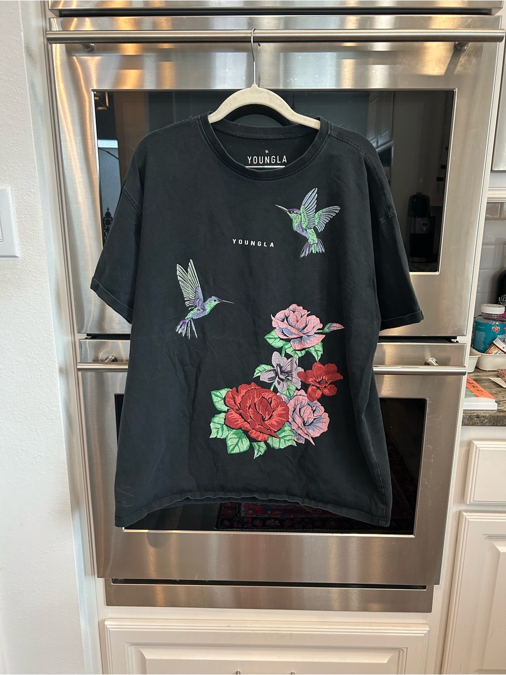 YoungLA Black Tee with Floral & Hummingbird Graphic size L has wear